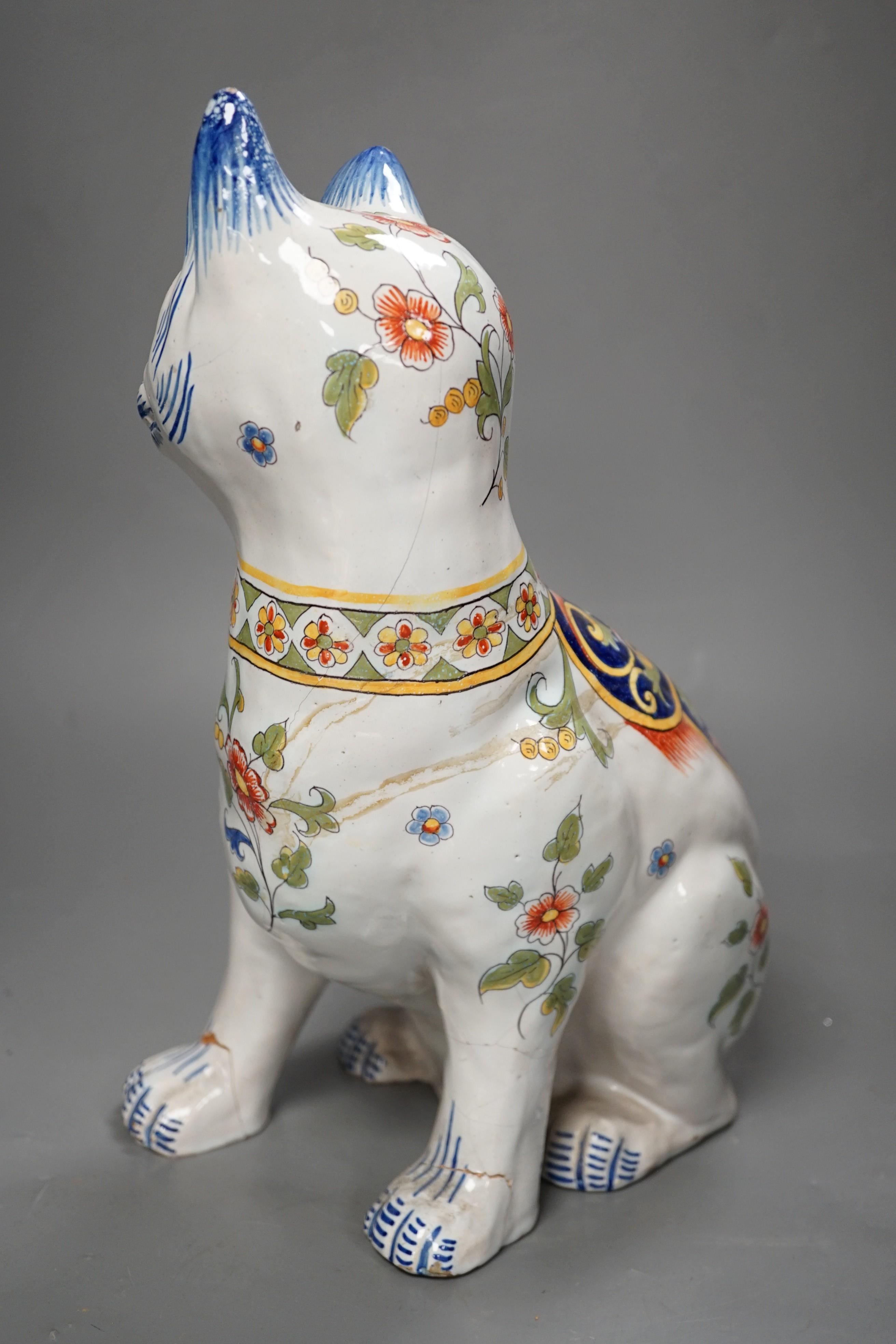 A Mosanic faience model of a seated cat, 31cms high